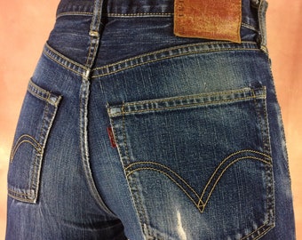 Jean Levis 502 vintage taille 29, Jean en denim déchiré effet vieilli des années 90, délavage moyen, fabriqué au Japon, taille 29", moyenne