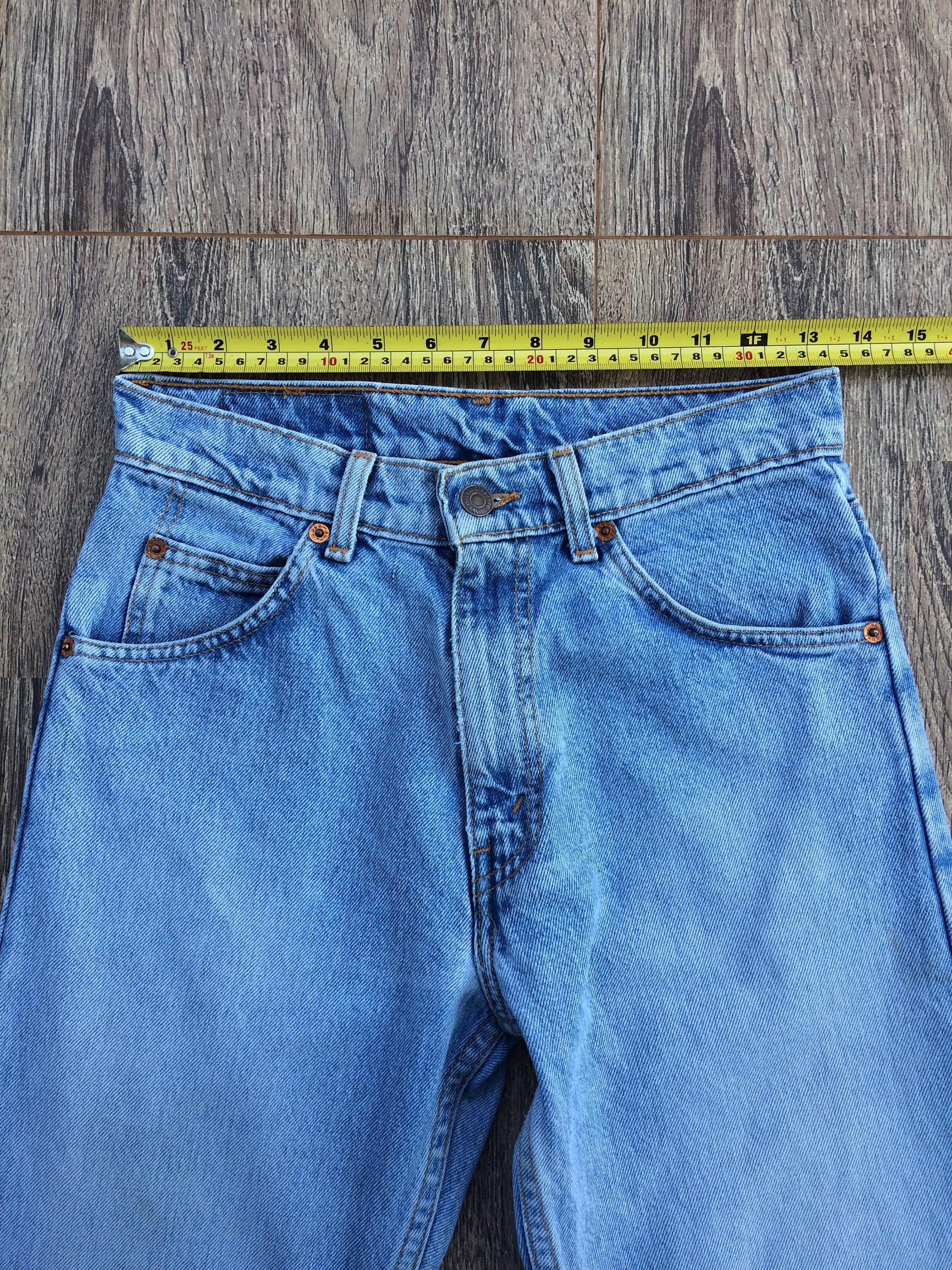 Vintage Levi's 607 Jeans – Orange Tab, Slim Straight Fit, W27 L33