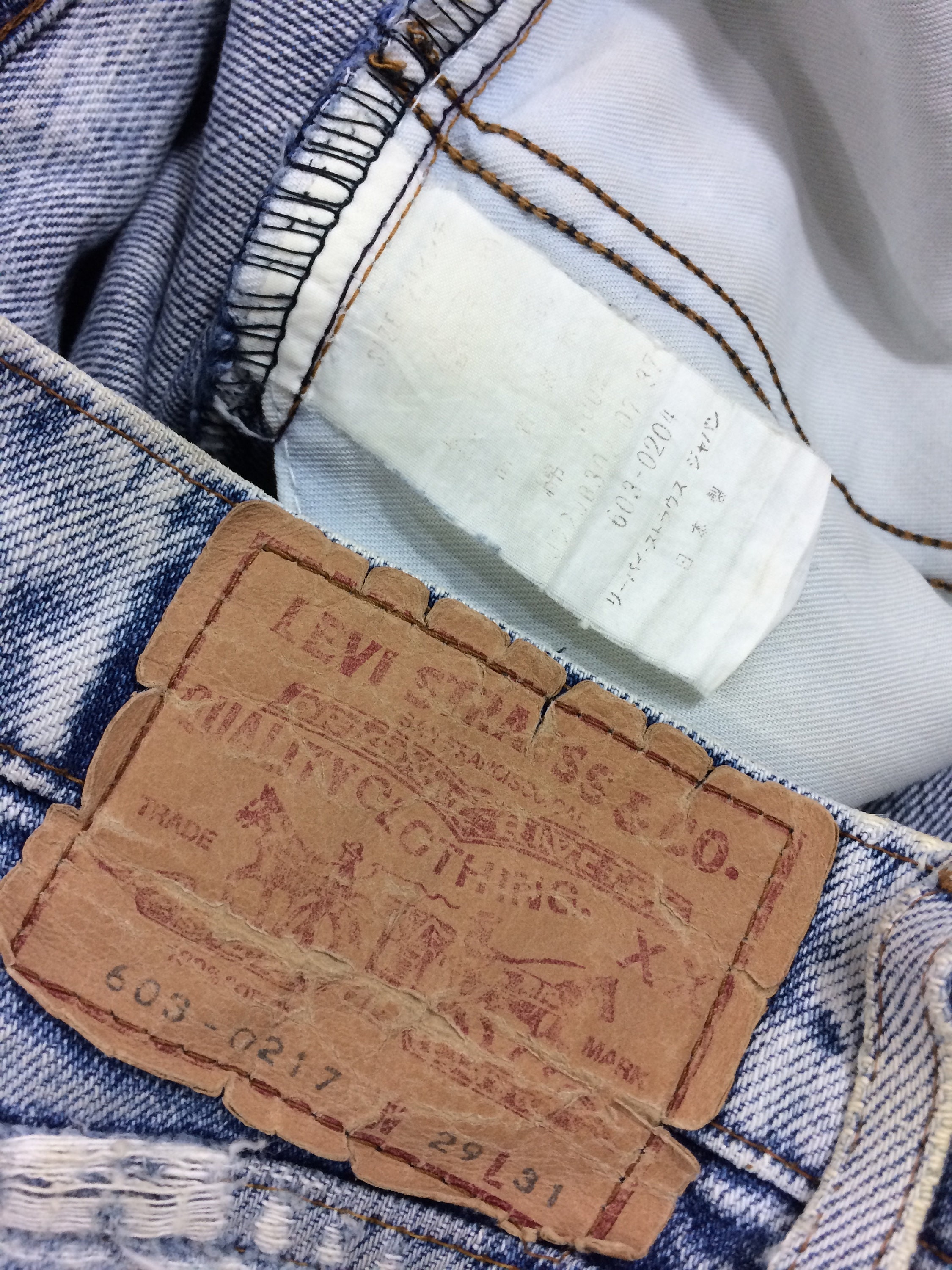 Size 28 Vintage Levi's 603 - Acid Wash - 90s Distressed Size 28 Vintage Levi's 603 - Acid Wash - 90s Distressed