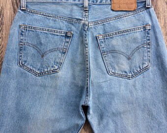 W32 L32 Vintage Levis 501 Light Blue Distressed Faded Denim Made