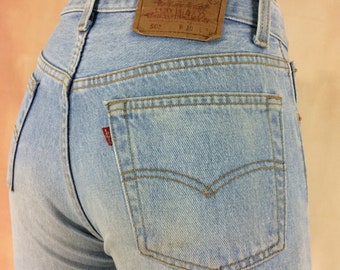 Sz 28 Vintage Levis 501 Distressed Light Wash Women&#39;s Button Fly Jeans Mid Waisted Slim Fit Tapered Leg 90&#39;s Classic Mom Jeans Made In USA