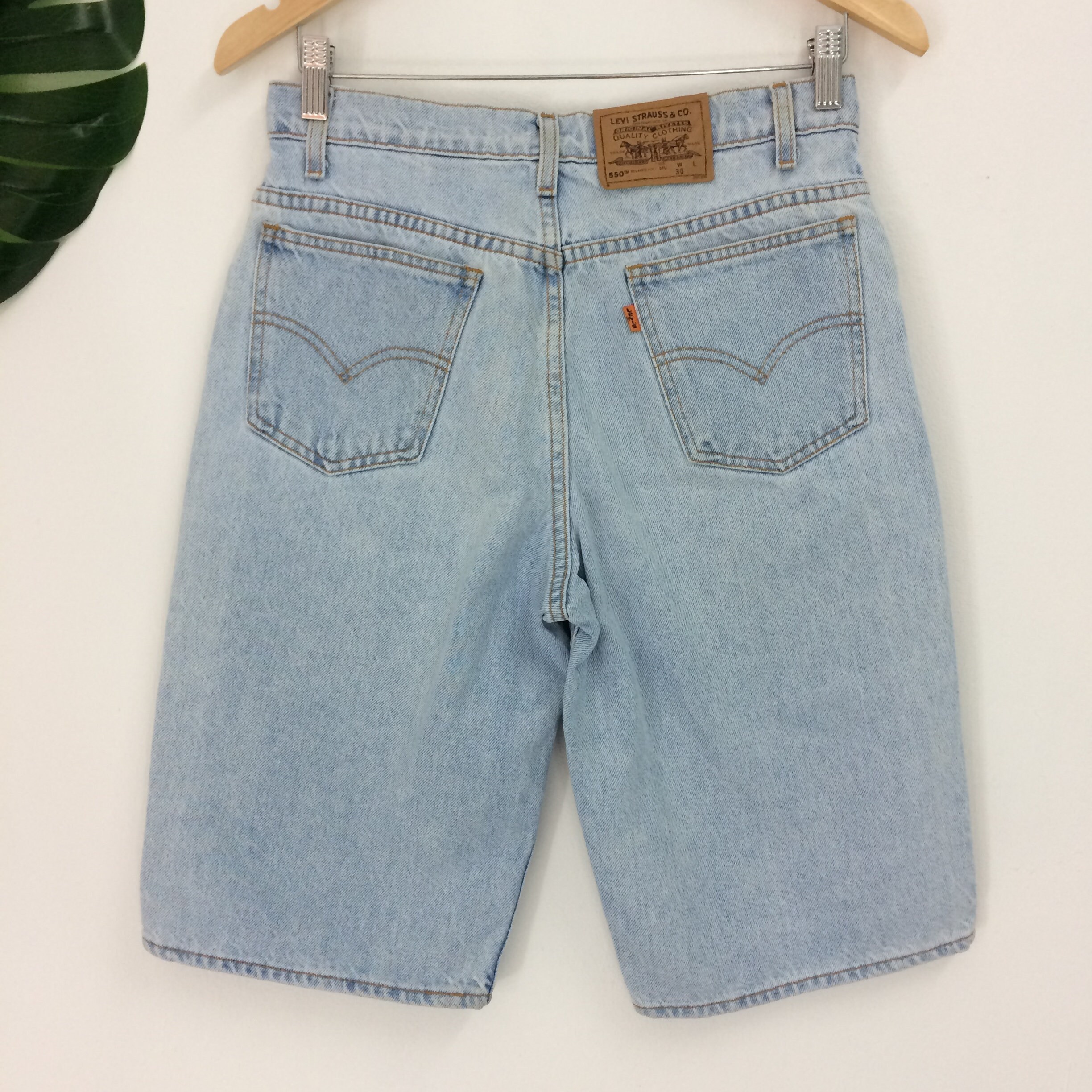 Size 28 Vintage Levi's 550 Distressed Light Wash Denim