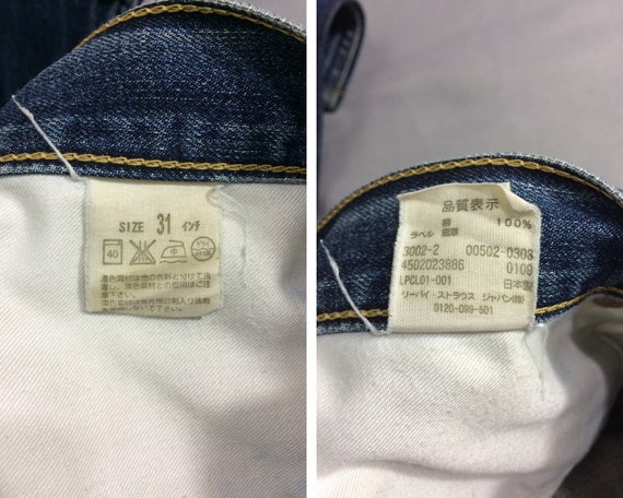 Size 29 Vintage Levi s 502 Jeans Medium Wash 90s Distressed Ripped