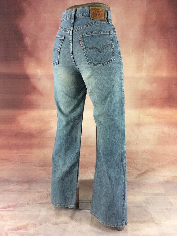 Size 26 Vintage 1990s Levi's 557 Bootcut Jeans - Wide Leg Size 26 Vintage 1990s Levi's 557 Bootcut Jeans - Wide Leg