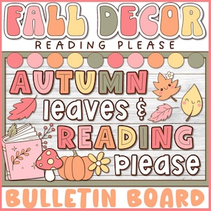 May include: A digital bulletin board graphic featuring the text FALL DECOR, READING PLEASE, AUTUMN LEAVES & READING PLEASE, and BULLETIN BOARD. The design includes illustrations of a pink book, a mushroom, a pumpkin, a flower, and smiling leaves in shades of pink, orange, yellow, and sage green against a white wood-grain background.