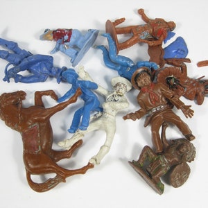 A small collection of 10 Vintage broken figures, spare parts , Indians - Cowboys ,Toy soldiers ,Wild West 1:32,54mm  Made in the 60s or 70s
