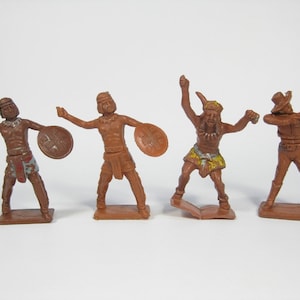 4 Vintage Plastic Cherilea toy soldiers &quot; Indians and cowboys &quot; plastic 60mm Toy soldiers. Damaged Plastic miniatures. Made in the 60s .lot2