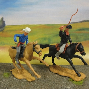 Two Vintage Timpo swoppet &quot;Mounted Cowboys &quot; ,Toy soldiers ,Wild West 54mm Probably made in England in the 60s or 70s.