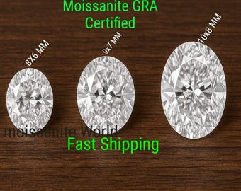 May include: Three oval-cut, clear, faceted moissanite gemstones arranged by size. The stones are labeled with dimensions 8x6 mm, 9x7 mm, and 10x8 mm. Text on the image reads Moissanite GRA Certified and Moissanite World Fast Shipping.