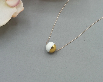 Porcelain and gold bead pendant, Minimalist ball pendant, Contemporary ceramic necklace, Ceramic jewellery, Modern ceramic necklace.