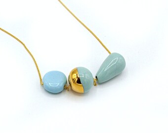 Ceramic beaded necklace, Modern ceramic necklace, porcelain and gold necklace,Designer Necklace, ceramic jewelry, sky blue pendant.