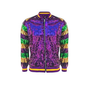 May include: A purple, green, and gold sequined bomber jacket with a zipper closure. The jacket has a ribbed collar, cuffs, and waistband.