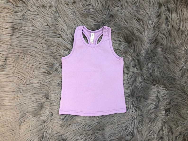 May include: A light purple sleeveless tank top with a racerback design.