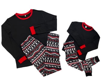 May include: A set of black long-sleeved shirts and matching pants with a red trim. The pants feature a festive Christmas pattern with red, white, and black reindeer, snowflakes, and Christmas trees.