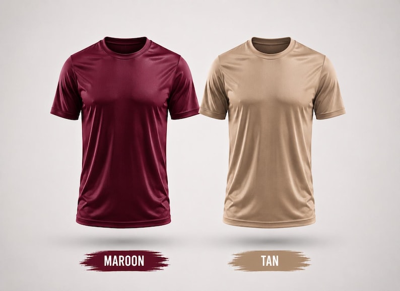 May include: Two short-sleeved crew neck t-shirts displayed side by side. The left shirt is a solid maroon color, and the right shirt is a solid tan color. Below each shirt is a brushstroke graphic with the text MAROON and TAN respectively.