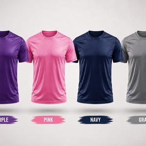 May include: Four short-sleeved crew neck t-shirts in purple, pink, navy blue, and gray. Each shirt is displayed with a corresponding color label underneath, reading PURPLE, PINK, NAVY, and GRAY, presented on a plain light background.
