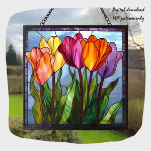 May include: A stained glass window panel depicting a colourful bouquet of tulips in shades of orange, yellow, pink, and purple. The tulips are arranged in a vase with green leaves. The window panel is framed in black and has a purple border.