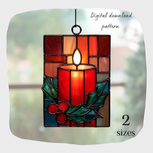 May include: Stained glass panel depicting a red candle with a glowing flame, adorned with holly leaves and berries. The rectangular panel has a black border and a hanging ring. Text reads "Digital download pattern" and "2 sizes".