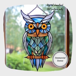 May include: Stained glass owl in blue, orange, green, and white. The owl has large orange eyes and hangs from a chain. The image includes the text "Digital download PDF pattern only" and "Commercial license".