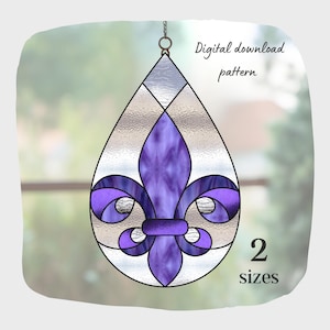 May include: A stained glass pattern in a teardrop shape, featuring a purple fleur-de-lis design. The pattern includes the text "Digital download pattern" and "2 sizes". The design is suspended by a chain.