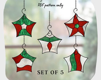 May include: Set of five printable stained glass patterns for Christmas ornaments. Each pattern features a red and green star with a different design. The patterns are available as a digital download in PDF format.