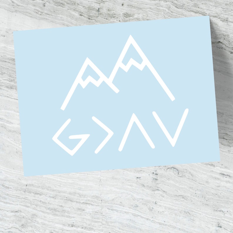 May include: A light blue background with a white mountain range graphic and the text "God is greater than the highs and lows".