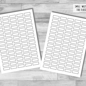 Peut inclure: Deux feuilles de papier blanc avec de petites étiquettes rectangulaires imprimées dessus. Les étiquettes sont vierges et prêtes à être remplies. Le texte "SMALL WHITE LABELS FOR FLOSS DROPS" est imprimé en haut de l'image.