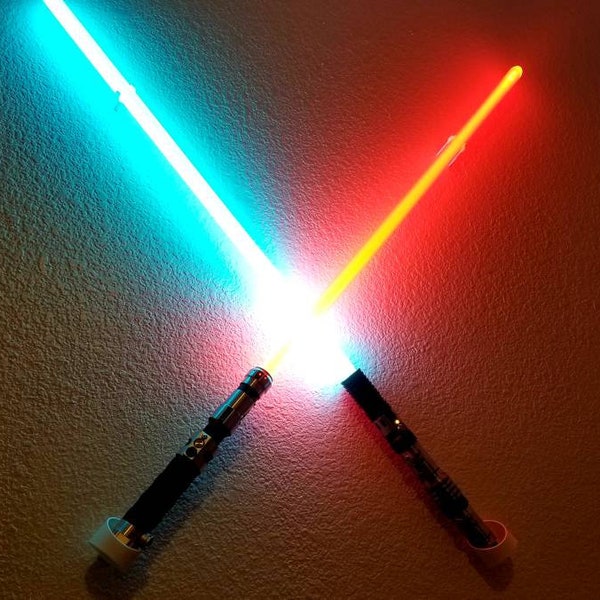 Juego de empuñaduras de exhibición para sable de luz en forma de cruz para montaje en pared