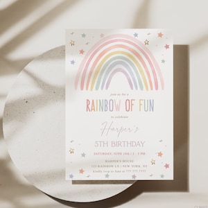 May include: A rainbow-themed birthday invitation with gold stars. The invitation reads "Join us for a Rainbow of Fun to celebrate Harper's 5th Birthday." The invitation includes the date, time, and location of the party.