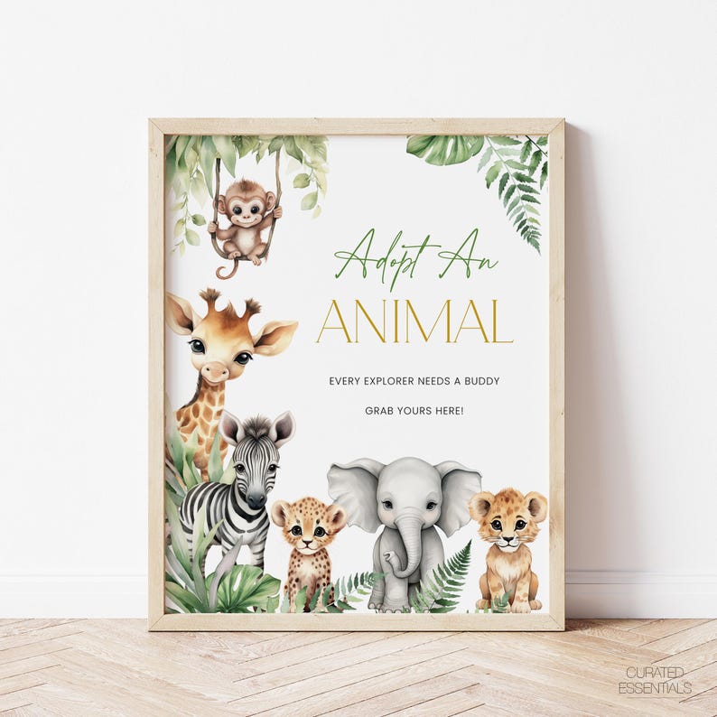 May include: A framed print with watercolor illustrations of jungle animals, including a monkey, giraffe, zebra, cheetah, elephant, and lion. The text reads "Adopt An Animal" and "Every Explorer Needs a Buddy, Grab Yours Here!"