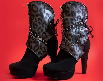Black and silver leopard print boot covers.