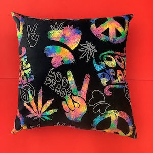 Peace and Love toss cushion. Cover is made with 100% cotton fabric.