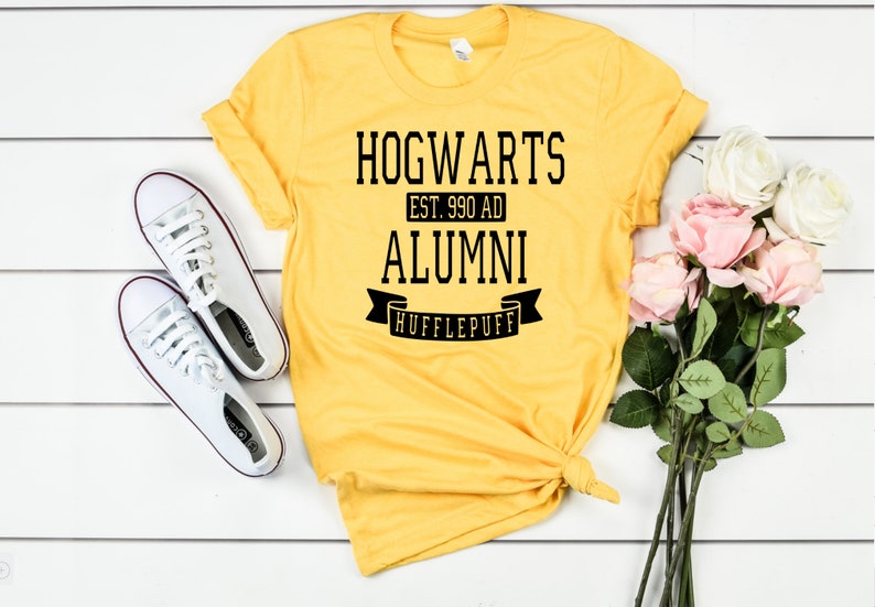 Yellow Hogwarts alumni Hufflepuff shirt. 