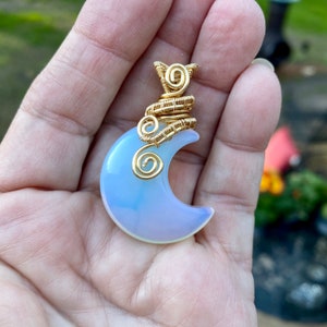 Opalite Crescent Moon Pendant Wire Wrapped in Gold Colored Anti-Tarnish Wire / Metaphysical Glass / Gold Colored Wire Wrap