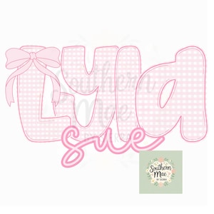 May include: Pink gingham-patterned name cutout with the name "Lyla" in bubble letters, a bow, and the word "Sue" in cursive. A logo with the text "Southern Mae by Sierra" is in the bottom right corner.