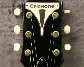 Vintage style headstock or amp bikini logo badge acid etched brass and silk printed