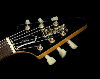 Insignia con el logotipo en baño dorado real del clavijero Flying V 58' con letras en relieve 3D