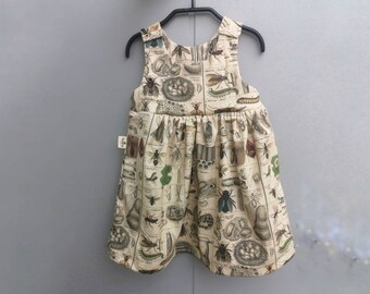 Girls pinafore dress with with historical print of insects, organic baby girl clothes, bugs party birthday outfit, bug out bash romper dress