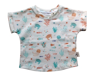 Bajo el tema del mar camiseta para bebés y niños, camiseta unisex marítima para niños pequeños, ajuste relajado y cómodo top de verano de manga corta para niños