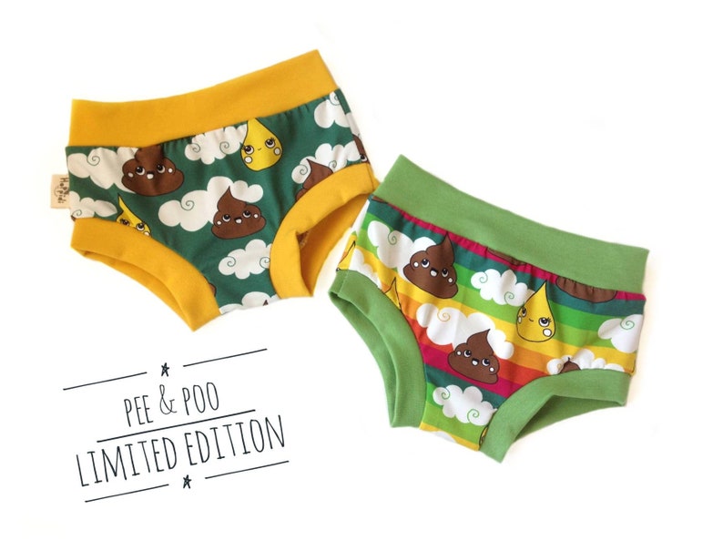 May include: Two pairs of underwear with a green background and a colorful rainbow pattern. One pair has a yellow waistband and the other has a green waistband. Both pairs feature a cartoon poop and raindrop design. The text "Pee & Poo Limited Edition" is printed below the underwear.