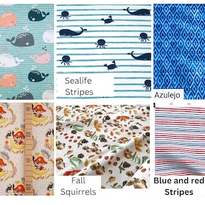 Op de afbeelding: Verzameling van stofstalen met verschillende patronen. Bevat een turquoise achtergrond met walvissen, blauw-witte strepen met zeedieren en een blauw ruitpatroon. Ook afgebeeld zijn apenpiraten, herfsteekhoorns en blauw-rode strepen.