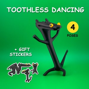 May include: Black 3D printed Toothless figure from How to Train Your Dragon, in a dancing pose. The figure has yellow eyes and is on a green background. The text "TOOTHLESS DANCING" and "4 POSES" is visible in the image.  The image also shows three black and yellow stickers of Toothless in different poses.
