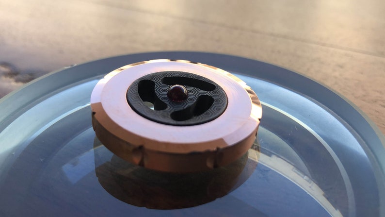 Spinning PERFORMER Coin two Ruby Bearings Challenge Coin Copper Rotor with side grips precision milled Black ZIRCONIUM core MetonBoss