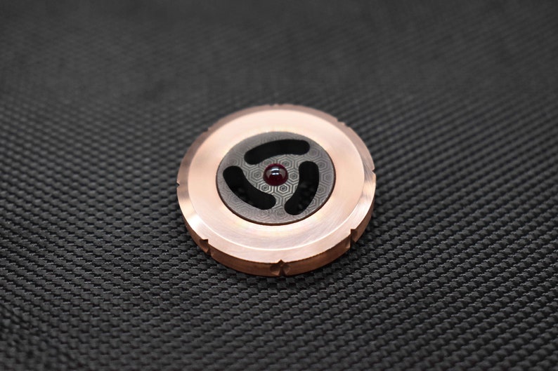 Spinning PERFORMER Coin two Ruby Bearings Challenge Coin Copper Rotor with side grips precision milled Black ZIRCONIUM core MetonBoss