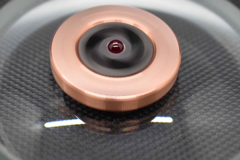 Spinning PERFORMER Coin two Ruby Bearings Challenge Coin Copper Rotor with side grips precision milled Black ZIRCONIUM core MetonBoss
