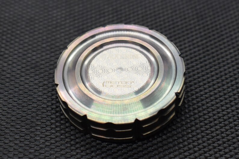 tungsten spinning top
