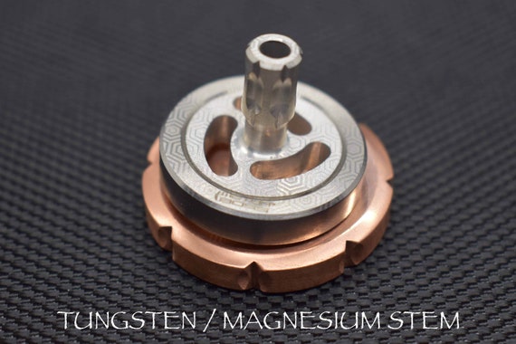 tungsten spinning top