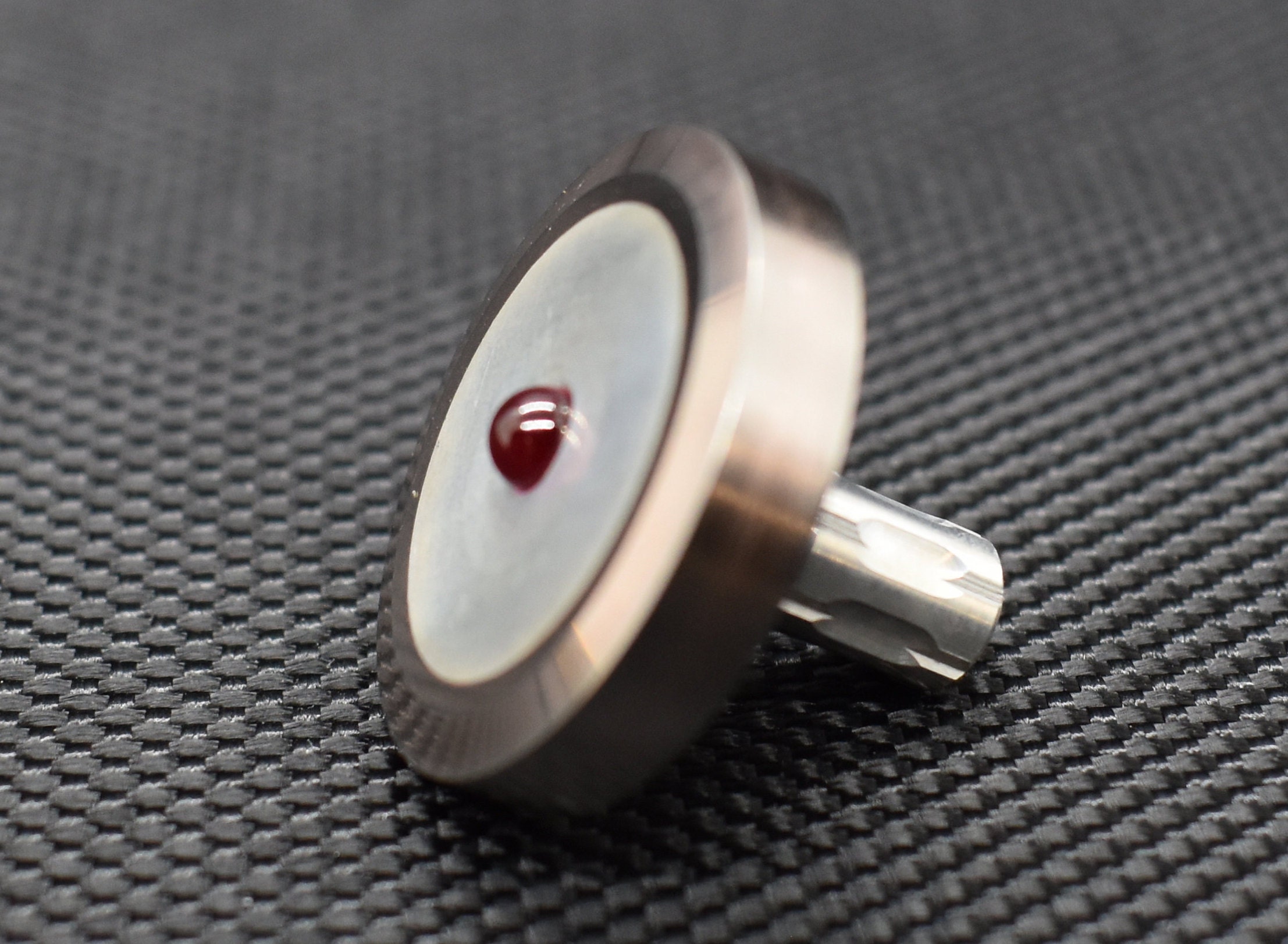 tungsten spinning top