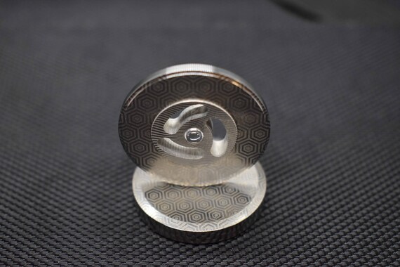 tungsten spinning top