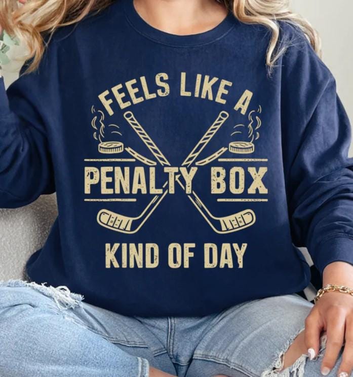 Feels like a penalty box kind of day. Youth and adult. Beige/gold/yellow distressed imprint only